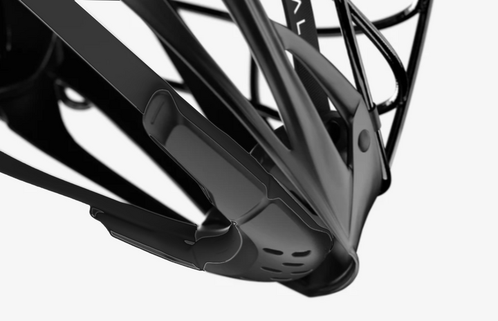Close-up of a matte black bicycle helmet showing the rear strap attachment and cage structure against a clean white background.